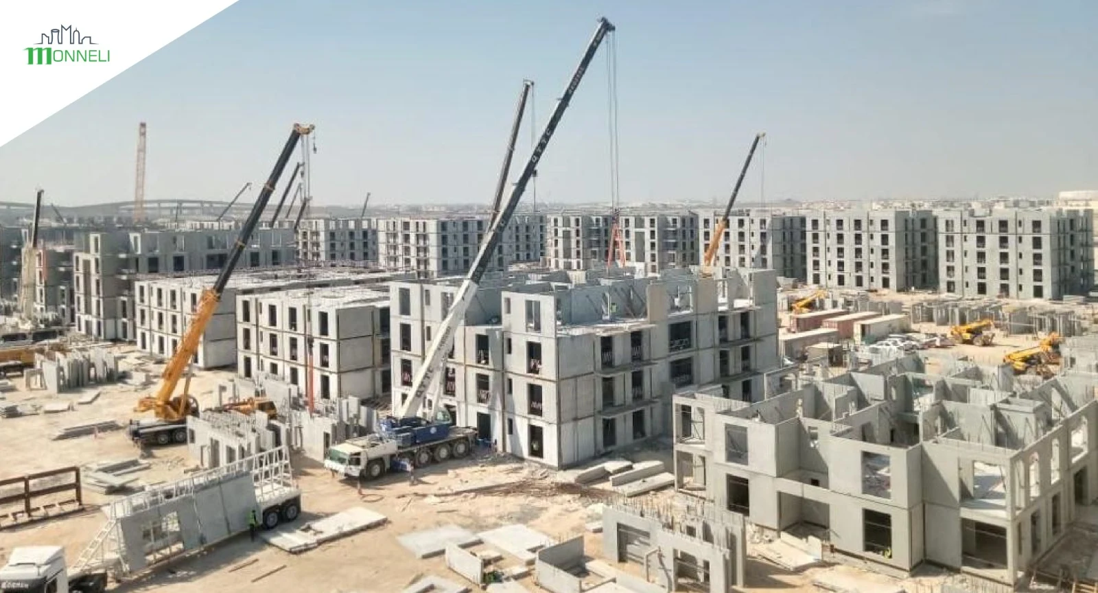 Supplied construction photograph showing residential buildings and cranes