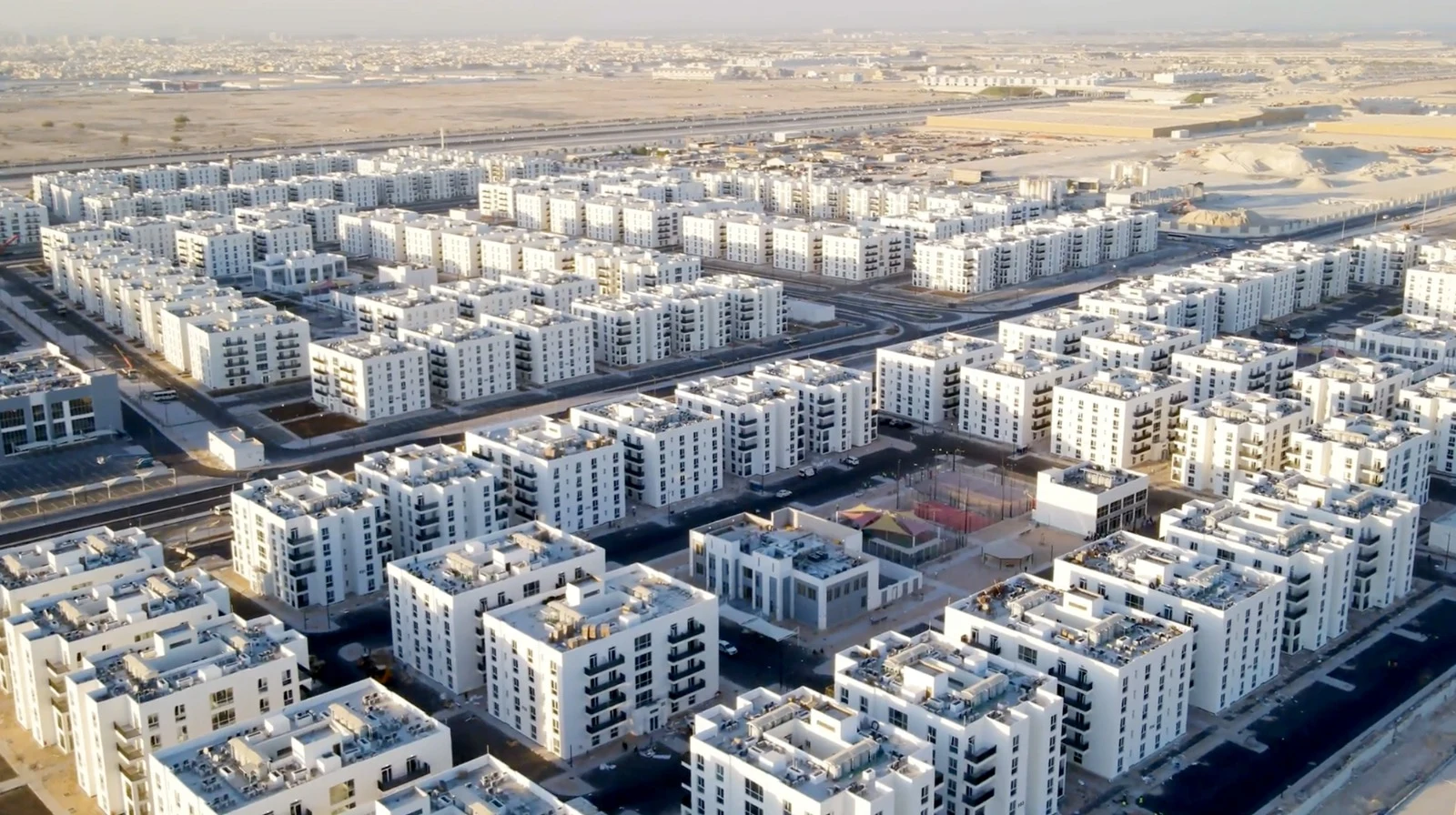 Apartment buildings and completed streets in the supplied Wakra aerial photograph