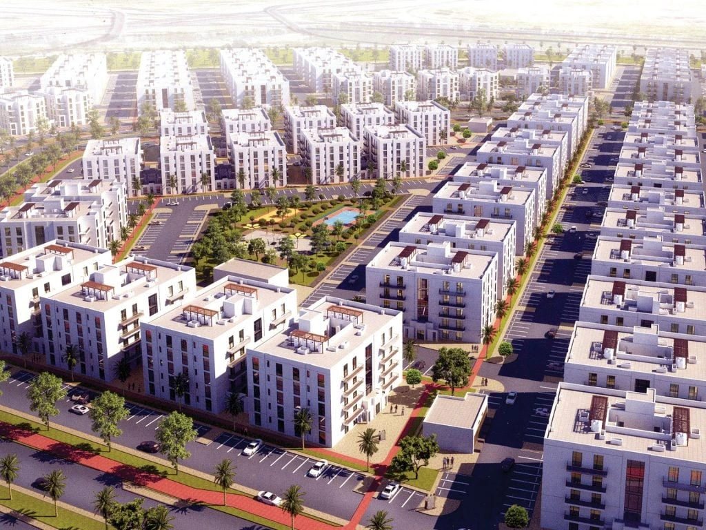 Supplied architectural visualization of the Wakra residential development, with apartment buildings and landscaped communal areas
